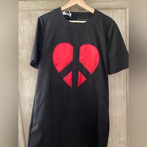 Black mini dress from MOSCHINO. Size Italian 44
